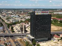 
	Achizitie de 14 milioane de euro. Skanska cumpara un teren de la Popoviciu, pentru un proiect de birouri
