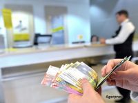 
	O bancă şterge o datorie de 43.000 franci elveţieni şi închide creditul unei familii cu trei copii din Bucureşti, care îşi achita cu greutate ratele
